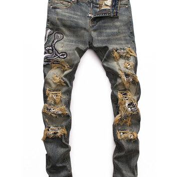 Джинсы с дырами и аппликацией Amiri 20293